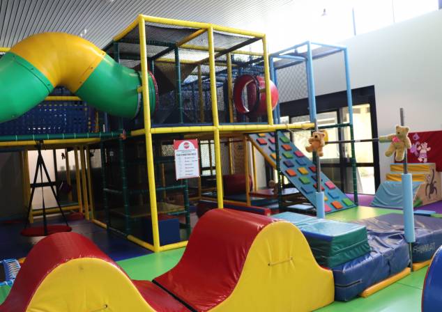 kids play equipment inside a toddler party venue